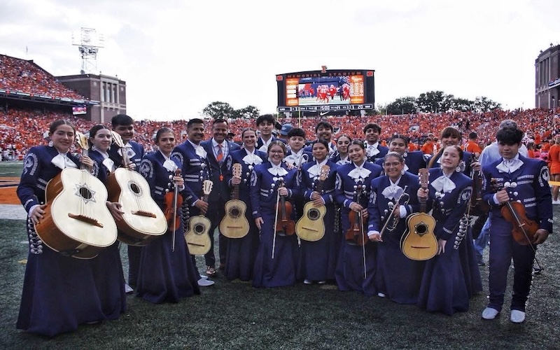 I'm in the back, to the right a bit